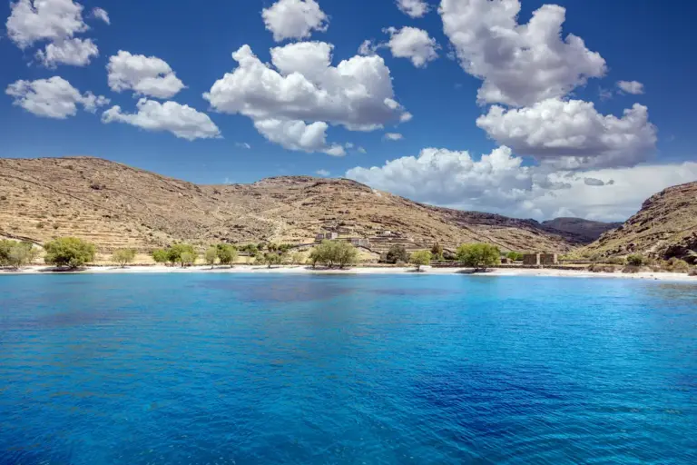 kythnos island greece approach agios ioannis sandy empty beach from sea sunny summer day